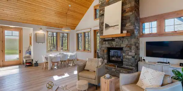 Image 2: Living Room to Dining and Entry
