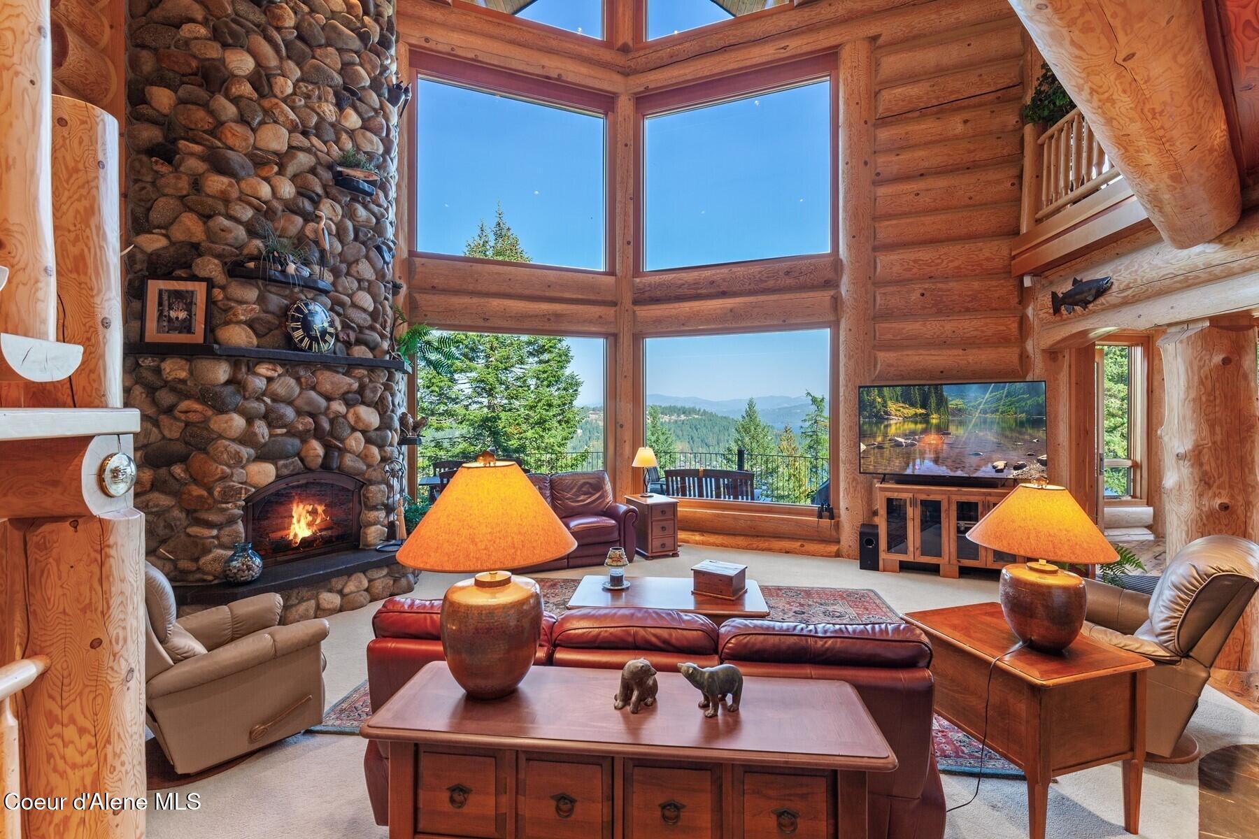 Image 2: Stone Floor to ceiling fireplace