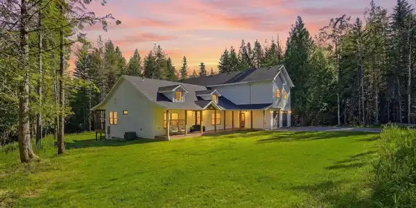 Image 3: Property is Surrounded with Mature Trees