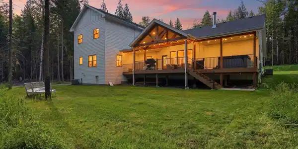 Image 4: Back Exterior at Dusk
