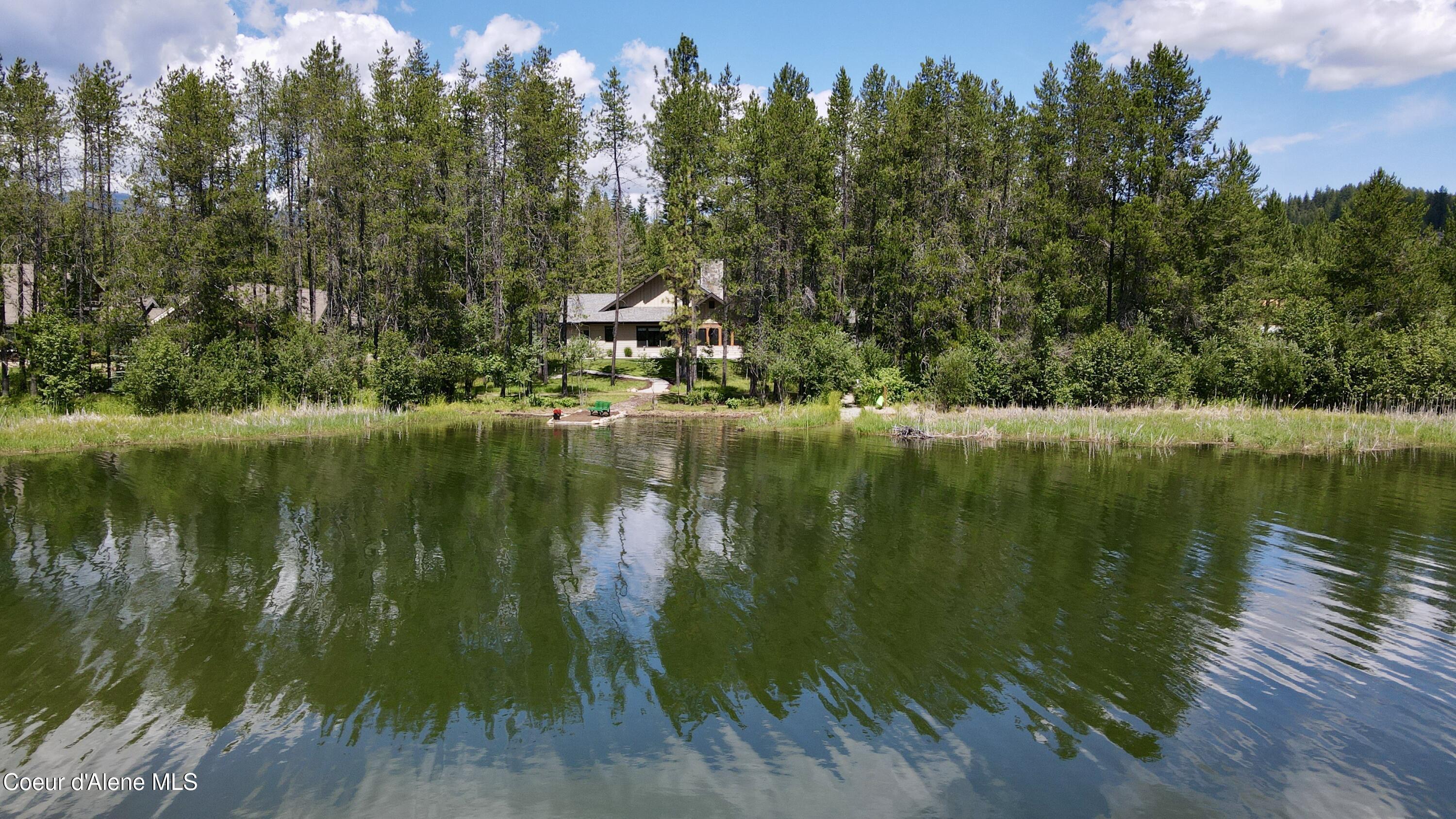 Image 2: 2. House view over water