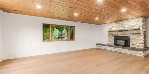 Image 4: 1st Floor Living and Wood Burning Stove