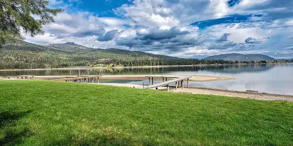 Image 4: Grassy riverfront dock