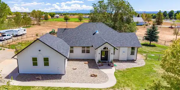 Image 2: Aerial Front of Home