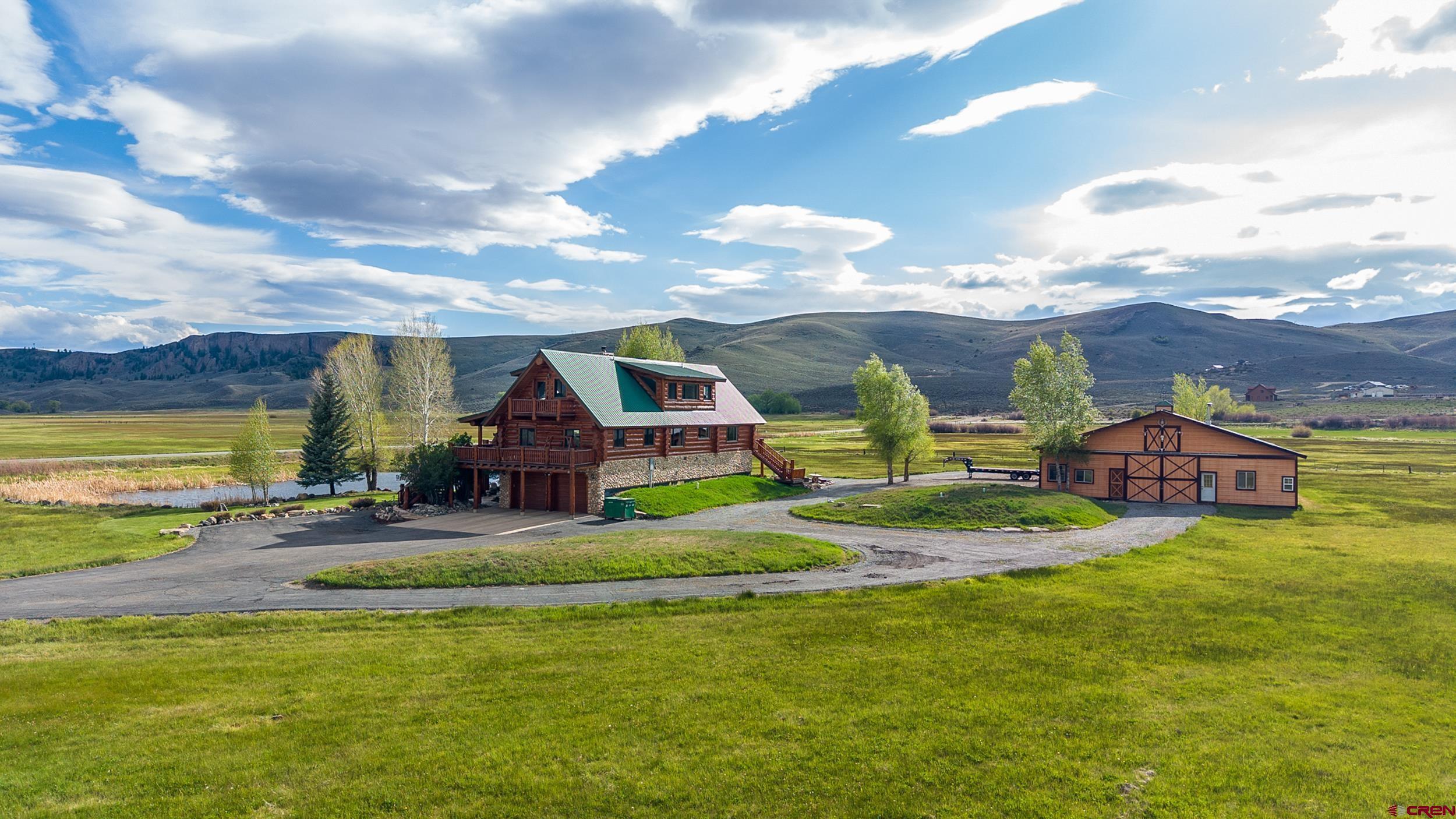 Image 4: View Barn and House