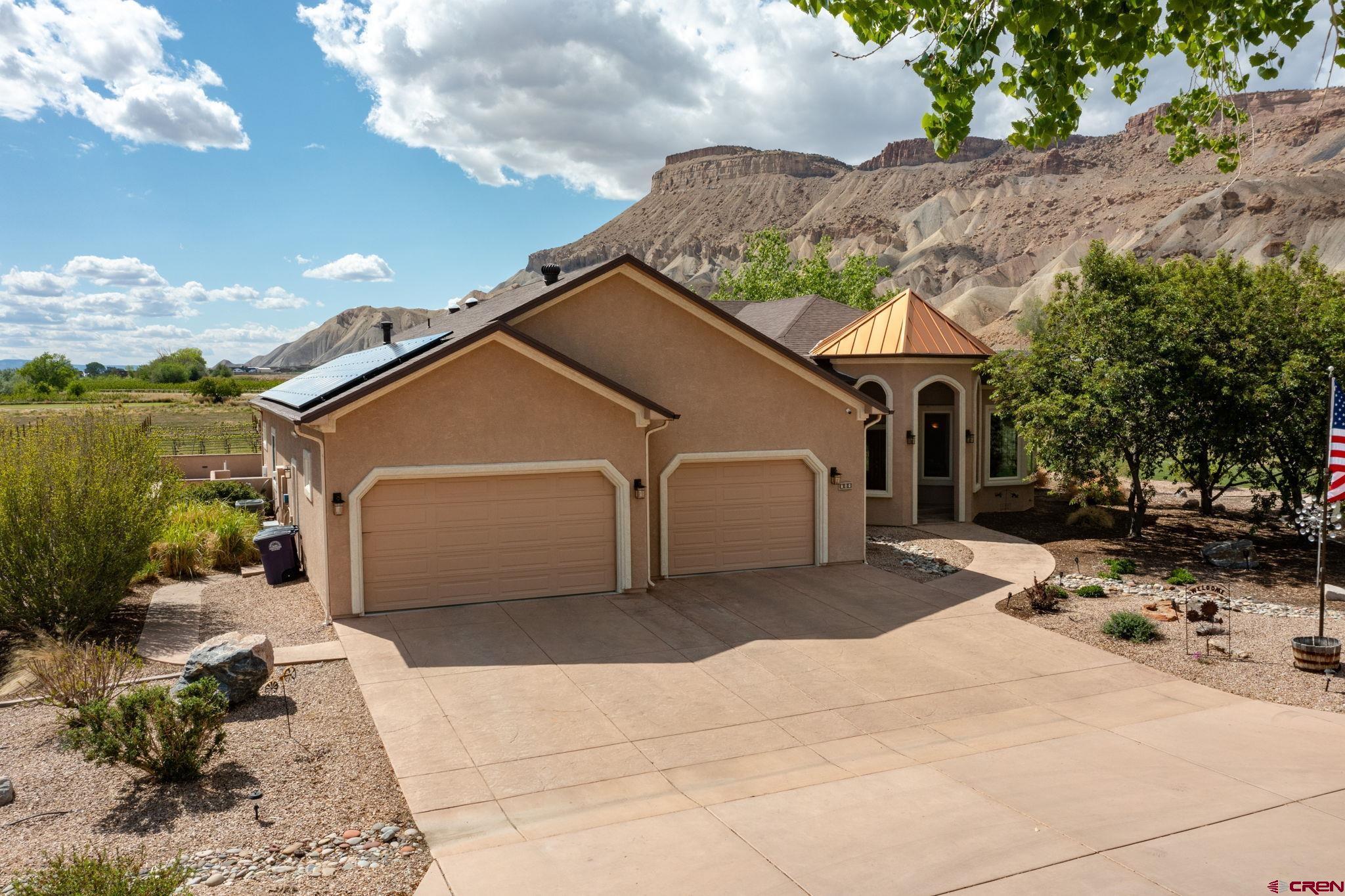 Image 3: Attached three car garage