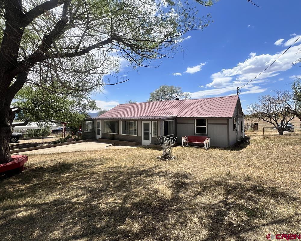 Image 3: front of house