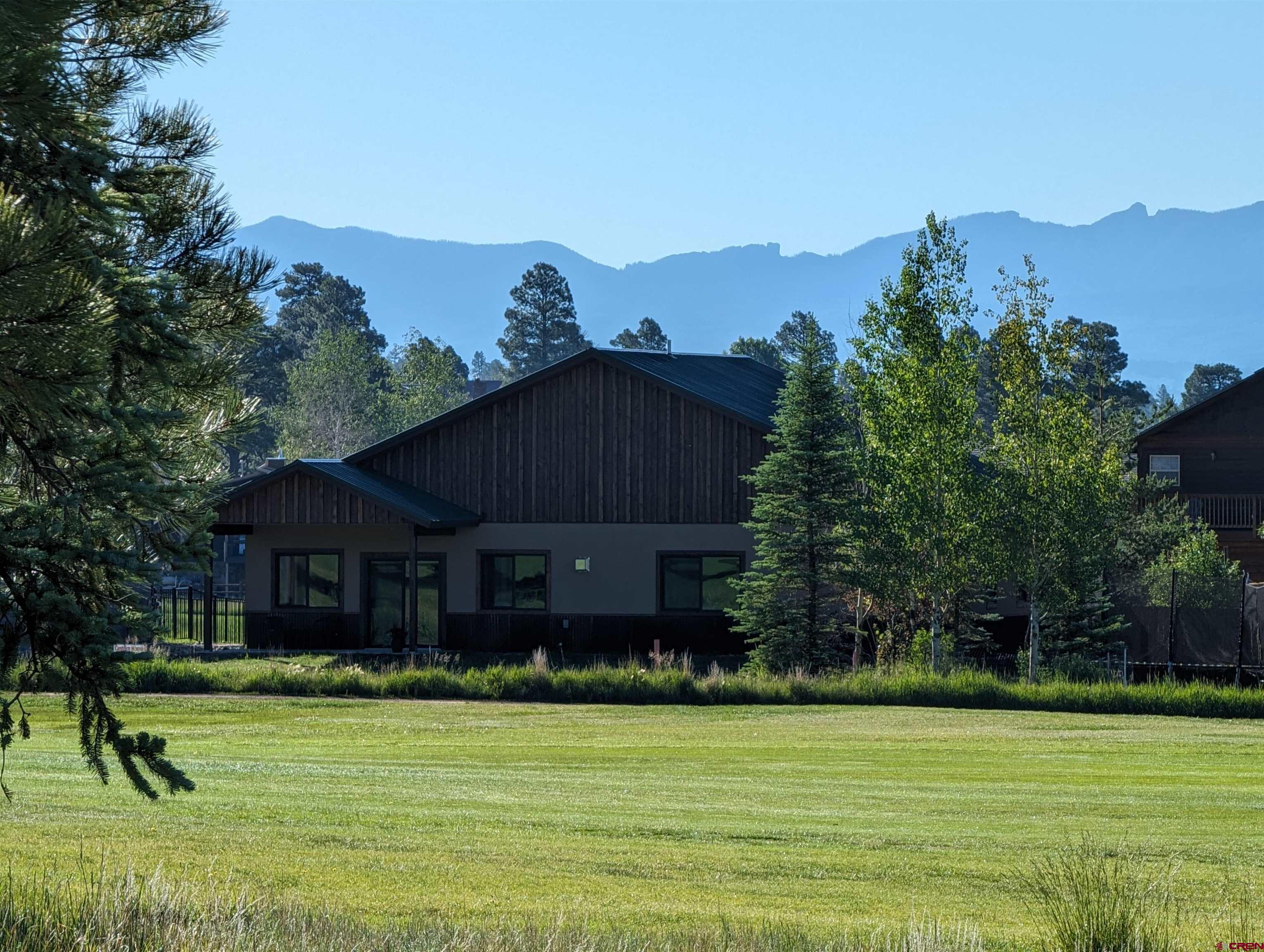 Image 2: early morning on the back side of the home on the golf cours