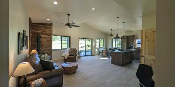 Image 2: wood look tile flooring throughout this home