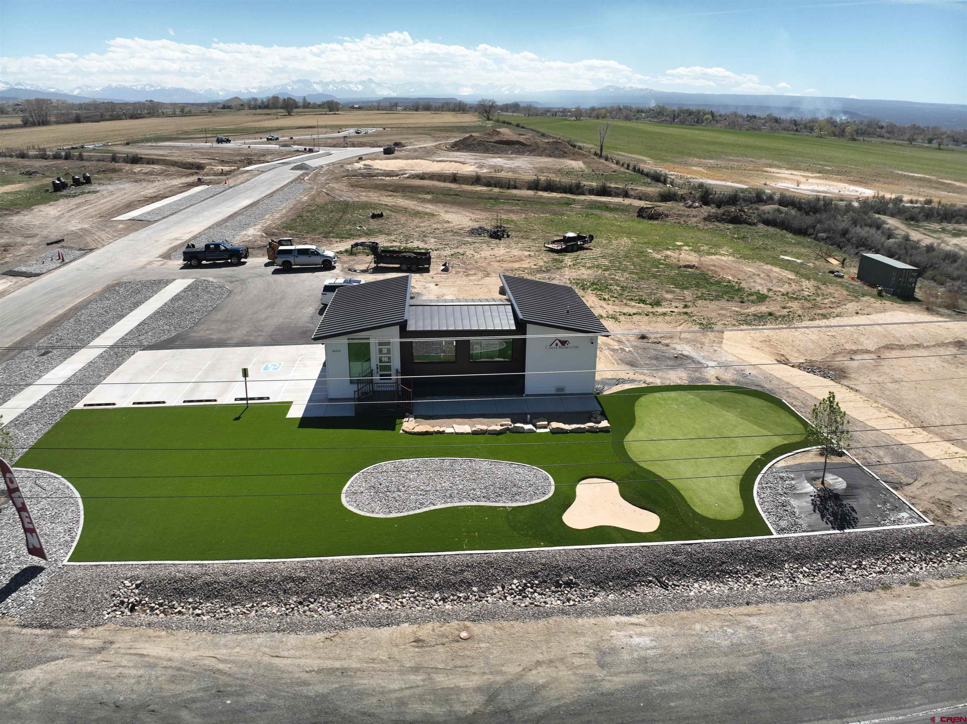 Image 3: Sales Center and Land