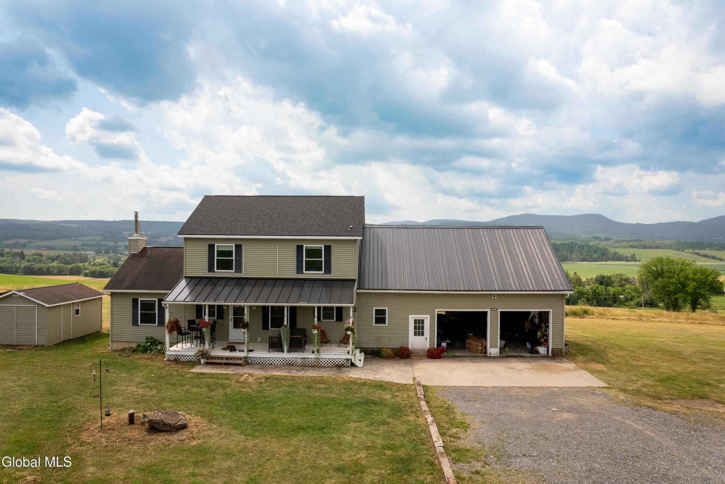 Image 1: House with 2 car attached