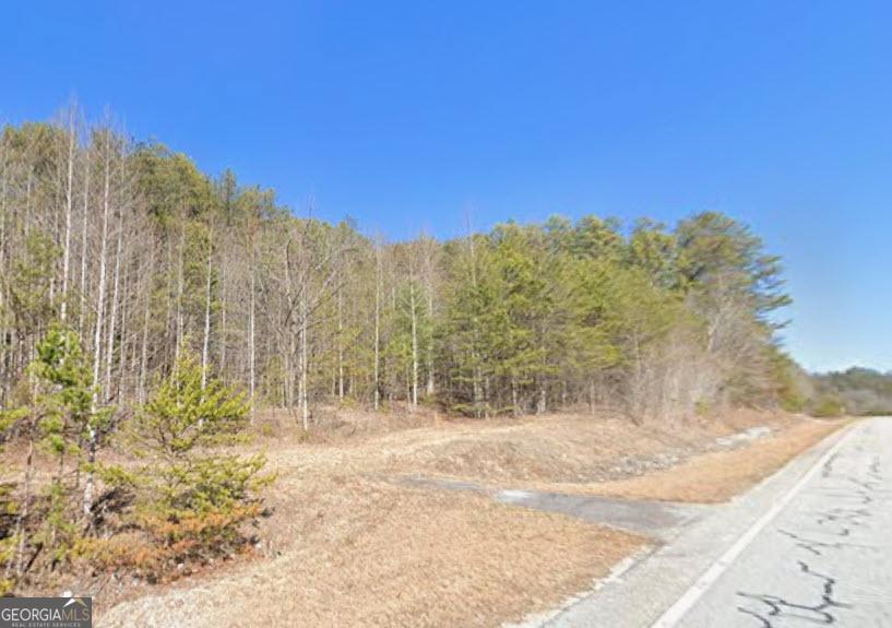 Image 1: Frontage looking NE on 76W