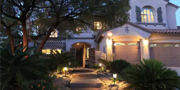 Image 4: Path lighting guides you to the welcoming entry of