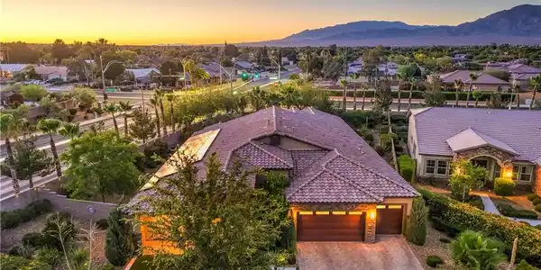 Image 3: An aerial perspective reveals a beautiful home and