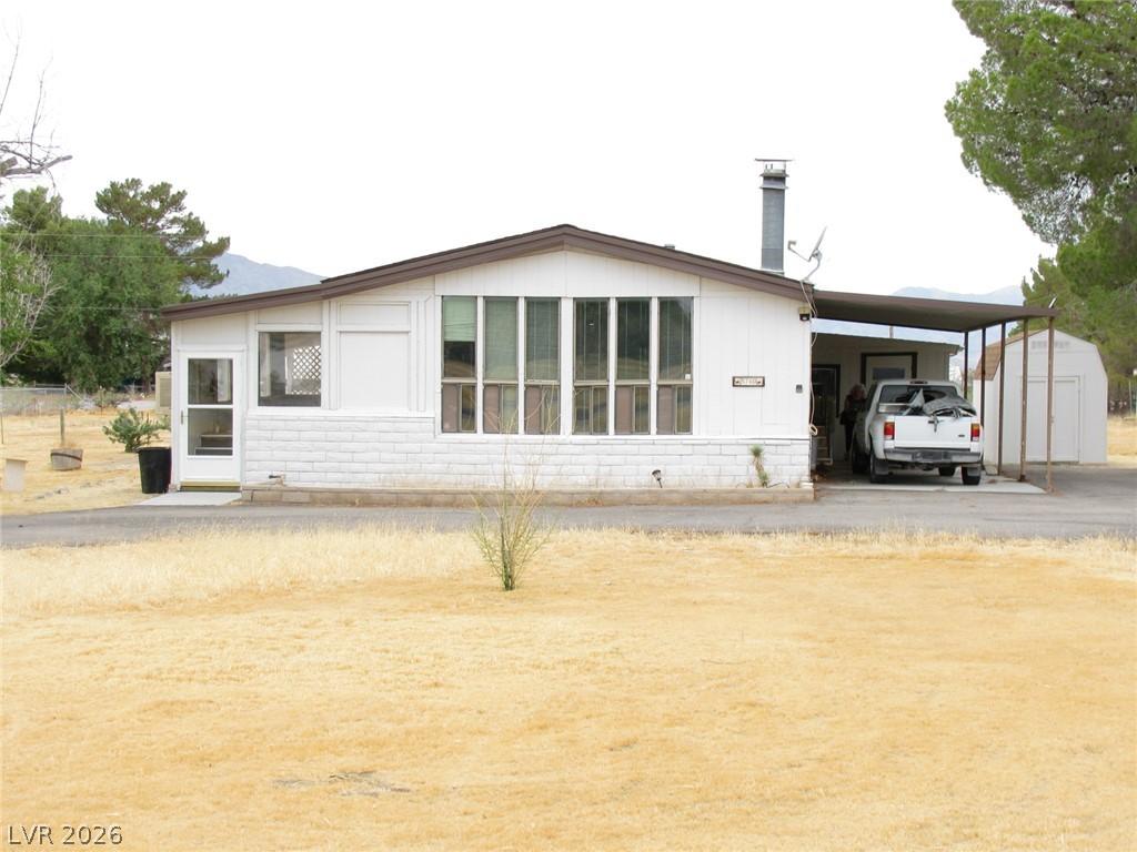 Image 1: A classic ranch home provides easy living with a c