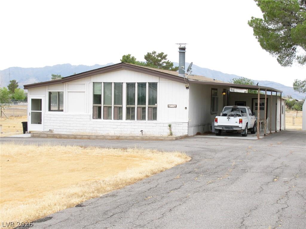 Image 2: A quaint residential structure featuring a broad c
