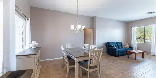 Image 4: Chandelier over formal dining area is on dimmer sw