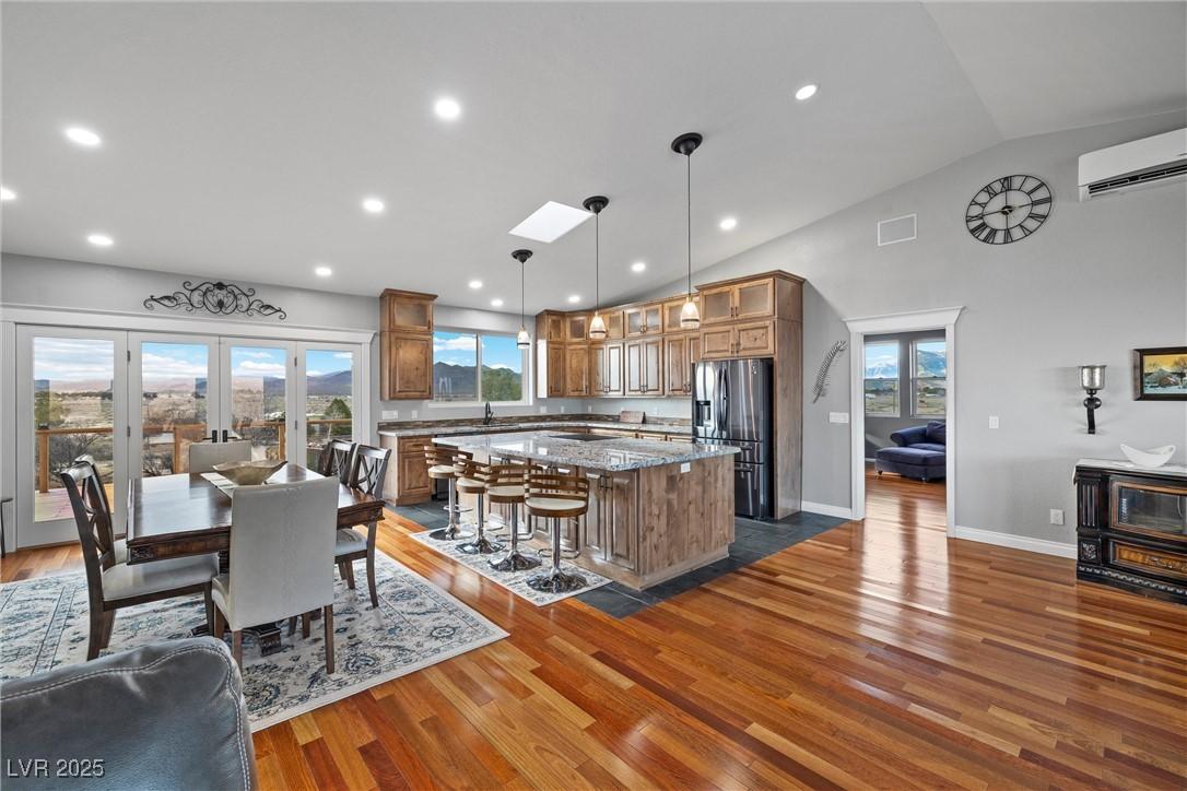 Image 3: Kitchen featuring a wealth of natural light, a wal