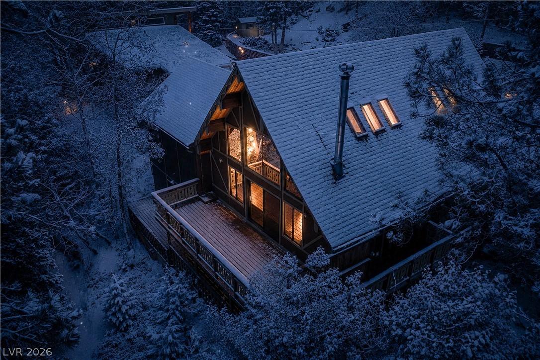 Image 3: Virtually rendered snow. Perched amidst the trees,