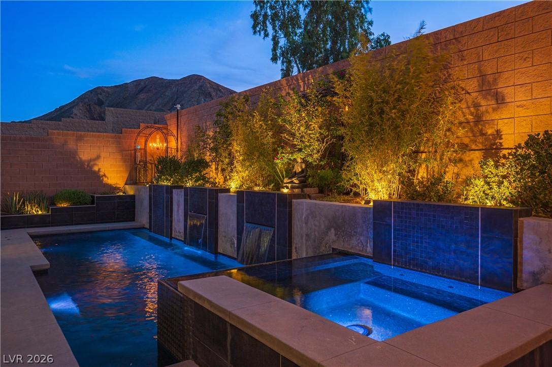 Image 2: A tranquil oasis awaits, complete with a illuminat