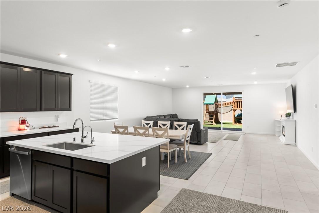 Image 4: This open-concept living space boasts a functional