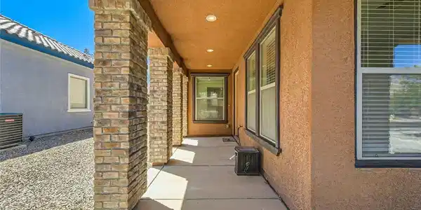 Image 4: Stone pillars and recessed lighting elevate this c