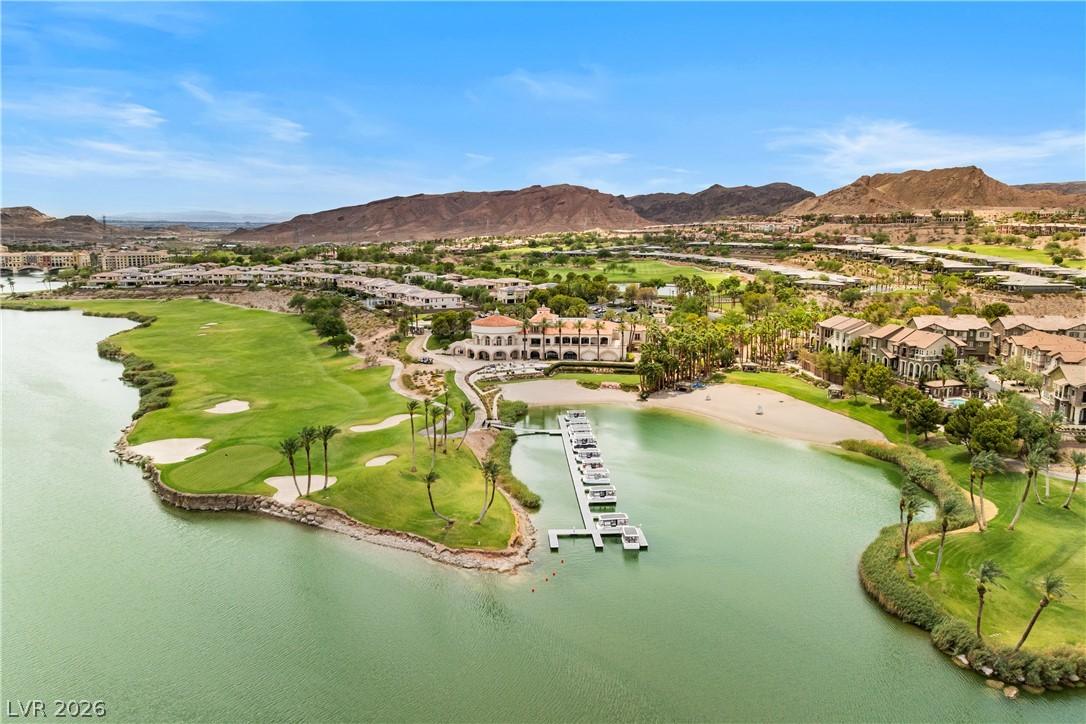 Image 3: Lush golf greens and a private marina grace this e