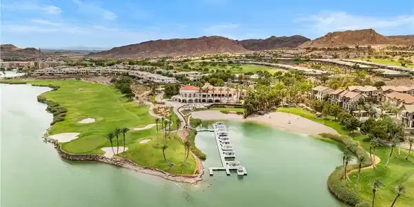 Image 3: Lush golf greens and a private marina grace this e