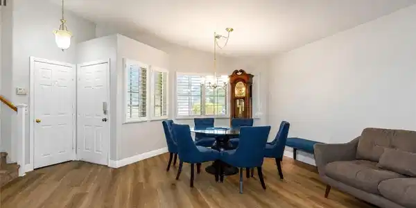 Image 3: This naturally illuminated dining room boasts ligh