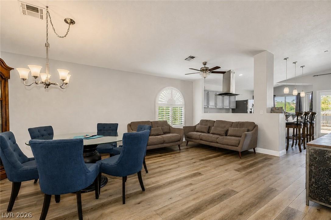 Image 4: An inviting open-concept living space features war