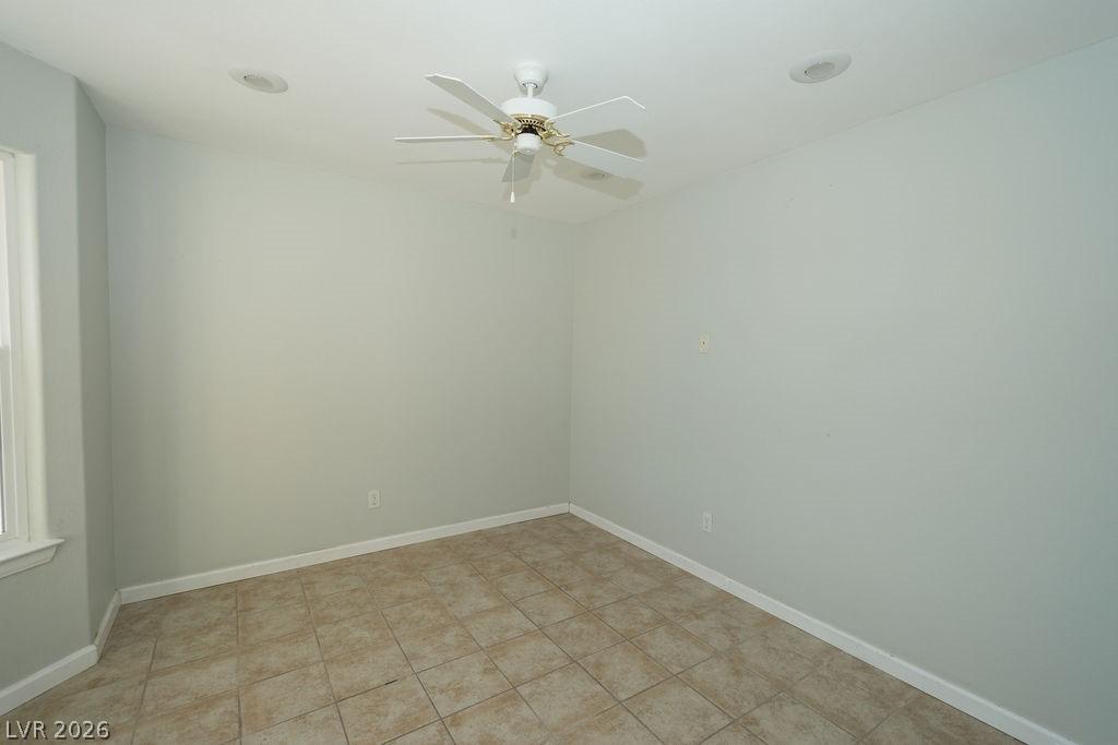 Image 3: Spare room featuring ceiling fan and baseboards