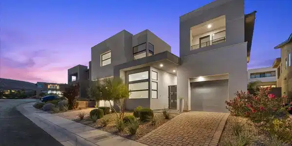 Image 3: Modern architecture with clean lines and mature la