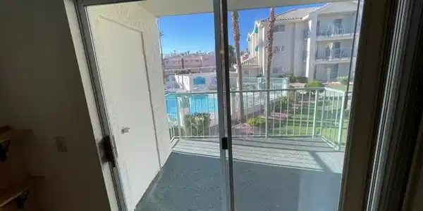 Image 3: Relax on your private balcony, enjoying serene vie