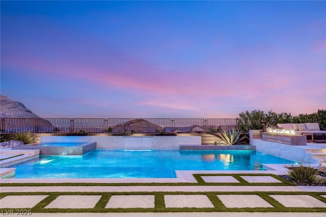Image 2: An inviting private pool and spa await, perfect fo