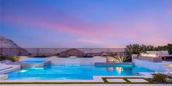 Image 2: An inviting private pool and spa await, perfect fo