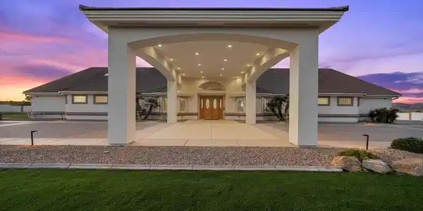 Image 2: View of main entrance with french doors