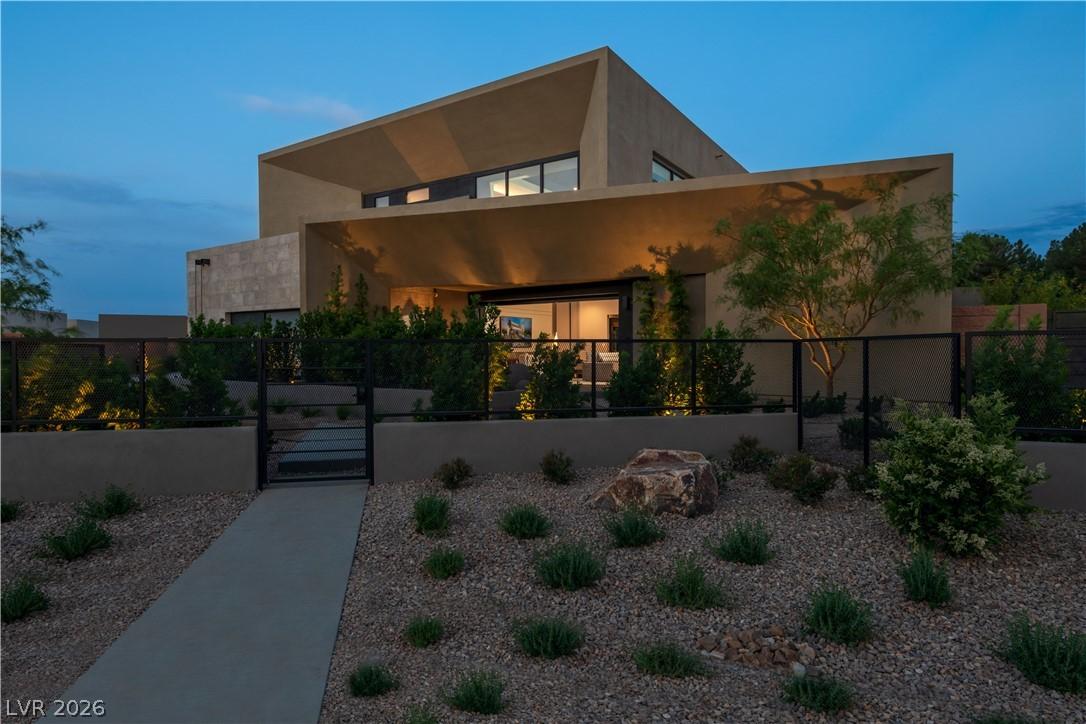 Image 2: Modern desert architecture with a welcoming pathwa