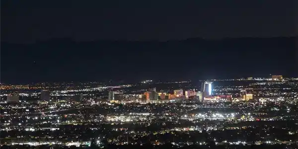 Image 2: The sparkling cityscape unfolds below, offering da