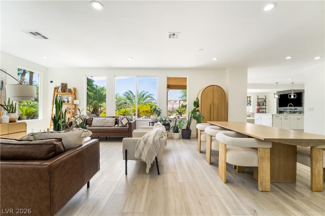 Image 4: Natural light floods this inviting living space, o