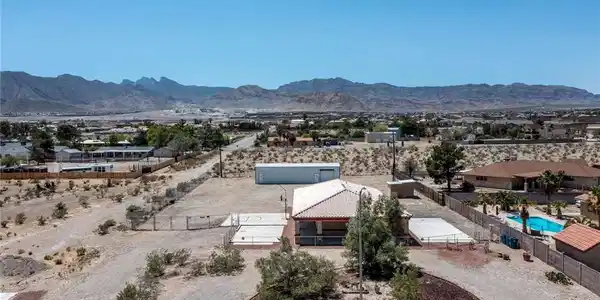Image 2: View of Property from Horseshoe Driveway.