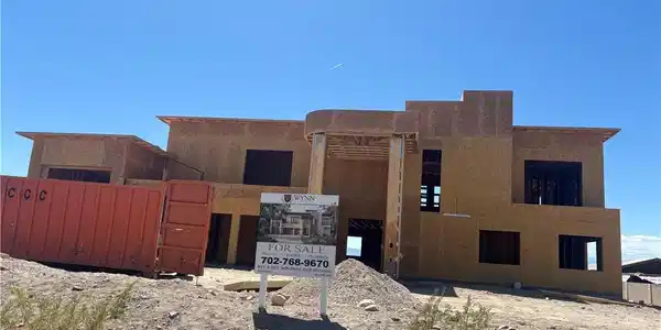 Image 4: Newly constructed residence under blue skies await