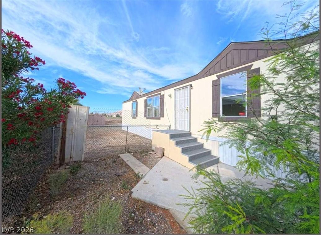 Image 3: This charming home offers a serene escape with pic