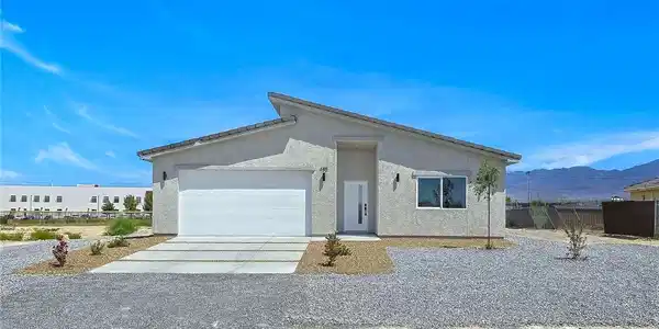 Image 2: Clean architectural lines define this modern singl