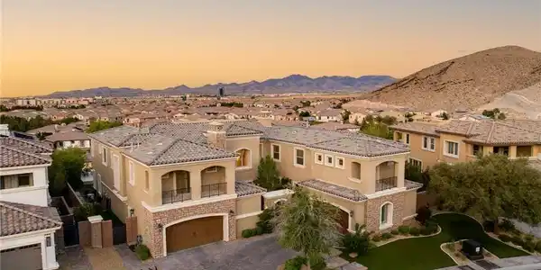 Image 2: This exquisite desert home features mountain views