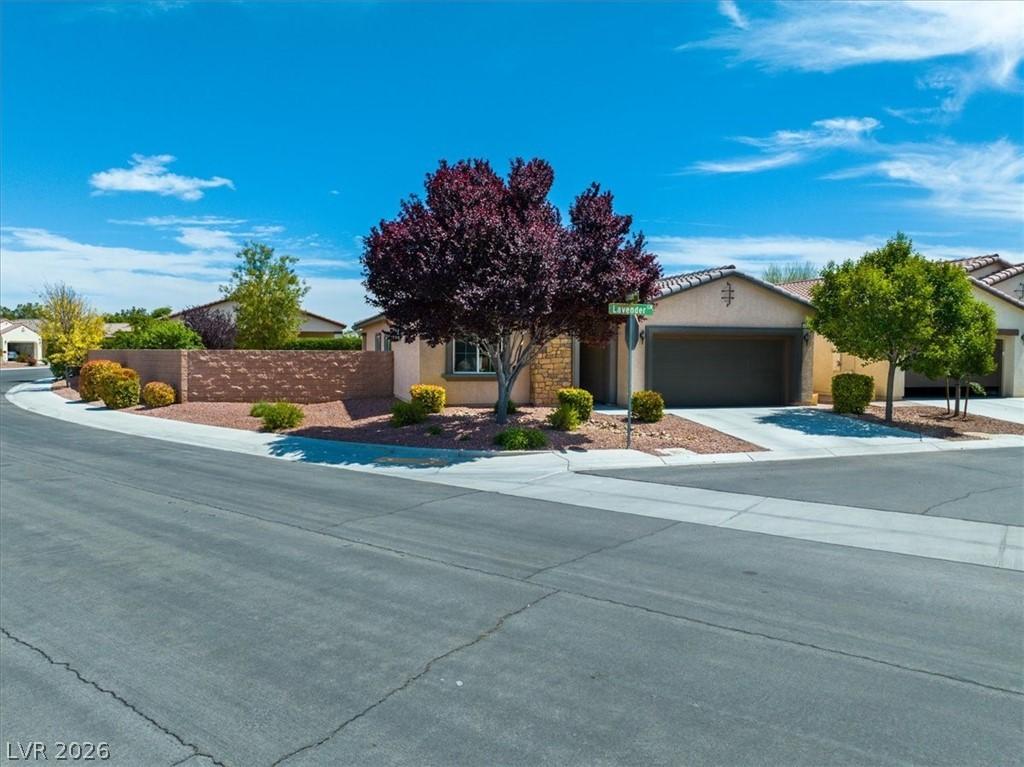 Image 1: This charming residence offers curb appeal with it