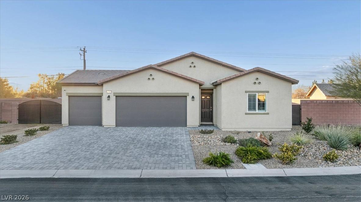 Image 1: A single-story dwelling with an inviting entryway
