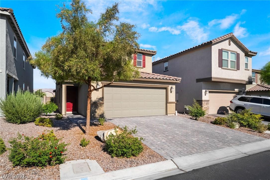 Image 1: A well-maintained suburban home featuring a block