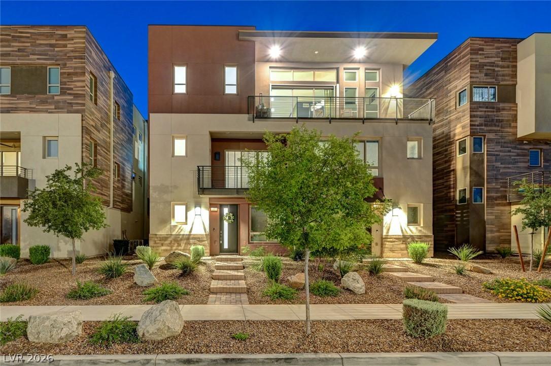 Image 3: A striking modern facade with multiple balconies a