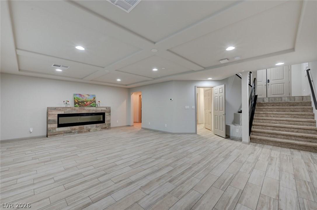 Image 4: A spacious recreation room awaits, featuring styli