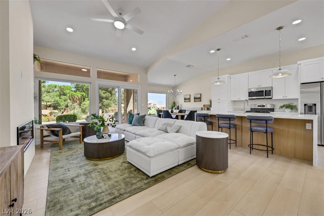 Image 2: Voluminous ceilings crown this open-concept living